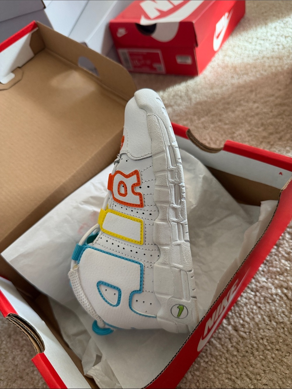 Nike Kids White Sneakers with Orange, Yellow & Blue Letter Accents